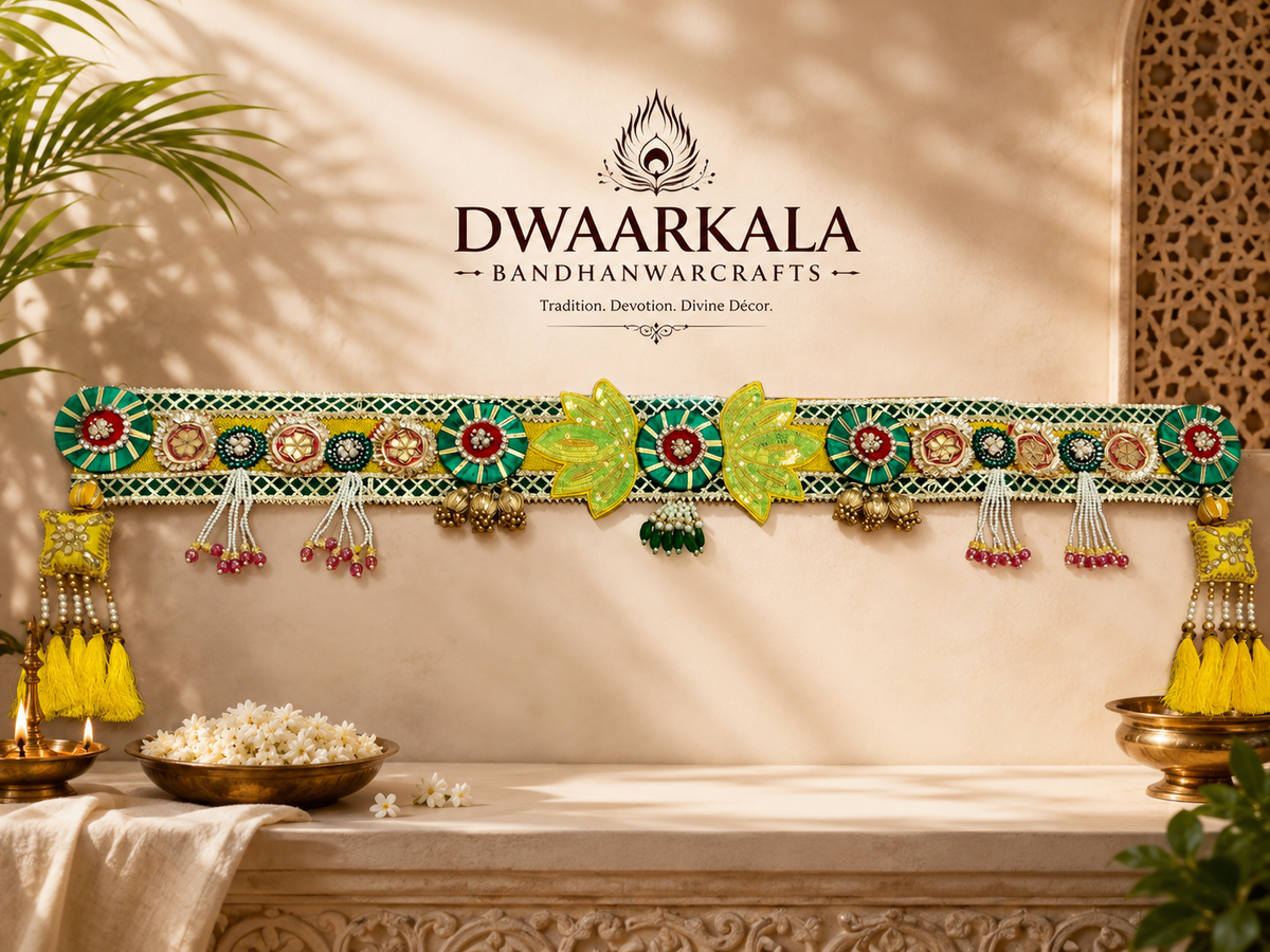 Green Leaf Emerald Toran – full hanging view against cream Mughal arch wall with jasmine & brass bowls